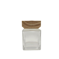 Bouteille d'eau de parfum remplie de logo personnalisé de 50ml 100ml 150ml 200ml 500ml Bouteilles en verre vides de diffuseur de parfum de roseau avec couvercle en bois
