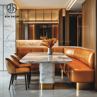 Meubles de restaurant, de café et d'hôtel modernes en cuir orange demi-cercle, table ronde en marbre, bois, canapé, banquette