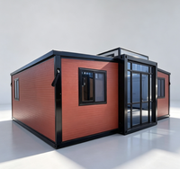 Maison conteneur pliable à double aile avec ailes extensibles, unité de logement mobile, construction en panneaux sandwich d'acier