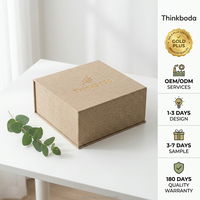 Boîte cadeau rigide de luxe personnalisée en lin texturé avec logo en feuille d'or, solution intégrée pour les cadeaux de Noël
