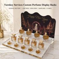 Présentoir pliable portable en acrylique transparent pour échantillons de parfum, avec panneau de fond personnalisé imprimé festonné et découpes en forme de bouteille variées