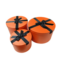 Fournisseur de la Chine en gros Boîte d'emballage en papier cadeau de forme ronde pour bijoux parfums multi-tailles personnalisés ensemble avec décoration à nœud