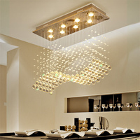 Lustre suspendu moderne de haute qualité pour table à manger rectangulaire, luminaires en cristal K9 en forme de goutte de pluie, pour maison de luxe