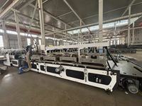 Machine d'assemblage automatique de panneaux pour carton ondulé