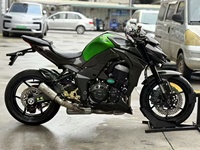 Moto naked Kawasaki 1Z1000 d'occasion, essence, 1000 cm³, moteur quatre cylindres, suspension réglable, plusieurs modes de puissance, puissante