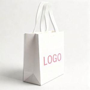 Sac en papier écologique de luxe pour boutique, avec logo de marque élégant imprimé, logo personnalisé, sacs cadeaux blancs, poignées en ruban laminé - Product Image 1