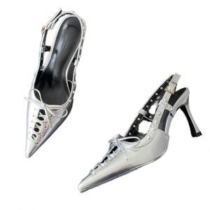 Sandales d'hiver pour femmes à lacets, à bride réglable, à talon aiguille super haut et fin, à plateforme, à bout pointu, avec rivets métalliques - Product Image 1