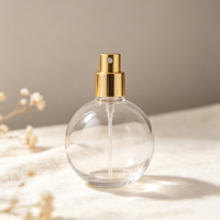 Flacon pulvérisateur de parfum sphérique en verre transparent 30ml 50ml 75ml 100ml vide avec impression personnalisée du logo pour emballage de parfum