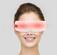 Masseur oculaire et facial intelligent 6D à vibration électrique, thérapie chauffante, pression d'air et musique, vente en gros