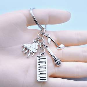 Llavero de moda con diseño de música, piano, micrófono y notas, colgante creativo para mochila, regalo - Product Image 2