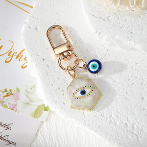Nouveau design Porte-clés Œil de protection en métal doré avec pendentifs Cœur, Étoile, Hexagone, Amulette porte-bonheur - Product Image 4