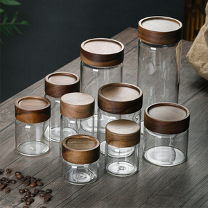 Prix d'usine Nouveaux contenants de stockage en <span class=keywords><strong>verre</strong></span> utilisés avec noix d'épices au miel avec couvercles - Product Image 1