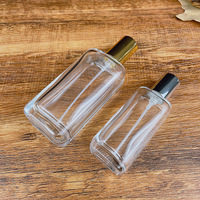 Venta al por mayor directa de fábrica: Botella de vidrio ámbar mate cuadrada de 30ml/50ml/100ml para aceite de perfume con boquilla personalizada serigrafiada