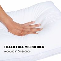 Coussin d'oreiller blanc doux et personnalisé de qualité hôtelière, neuf, ferme et confortable pour hôtels