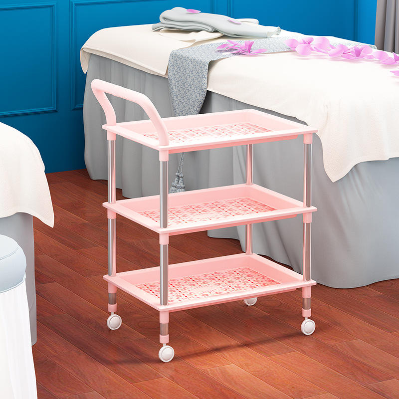 Pink three-tier stainless steel trolley