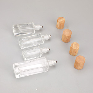 ขวดน้ำหอมแบบโรลออน 10 มล. แก้วพร้อมฝาไม้ไผ่ ภาชนะใส่น้ำมันหอมระเหยแบบพกพาขนาดเล็ก - Product Image 1