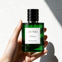 Flacon pulvérisateur de parfum vide en verre cylindrique de 30 ml et 50 ml avec logo personnalisé de qualité supérieure, pulvérisateur à brume fine, emballage cosmétique OEM ODM