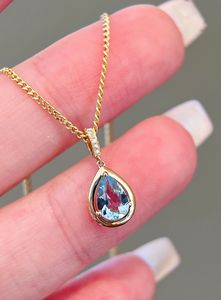 Pendentif pour femme Xinfly en or 18 carats avec pierre naturelle aigue-marine 0,55 carat en forme de goutte d'eau et diamant en forme de larme - Product Image 4
