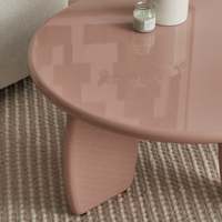 Table basse ronde moderne en argile brillante avec pieds arrondis en bois d'acacia