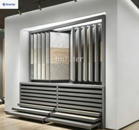 Meuble métallique moderne et écologique pour salles d'exposition - Tiroirs ouverts pour présentation de carrelages, de quartz et de marbre