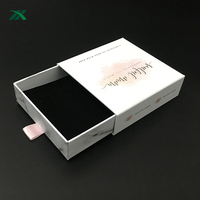 Boîte de présentation en papier mat recyclé rose personnalisé avec fente pour tampon en mousse de velours noir estampage de logo pour emballage de jeu de montres bijoux