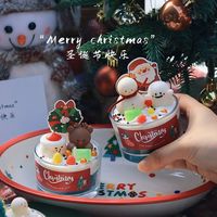 Bougie aromatique artisanale en cire de soja dans un verre en forme de bonhomme de neige pour cadeaux de Noël