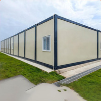 Maison conteneur à 2 étages en panneaux sandwich préfabriqués, étanche et facile à assembler, idéale pour mini-maison ou boutique - Vente chaude