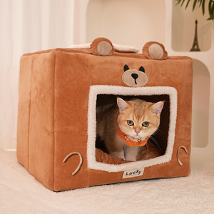 Un petit lit pour chat en forme d'ours, confortable, chaud et sécurisé en hiver ; doux, chaud et offrant un excellent soutien pour votre animal. - Product Image 1