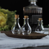 En stock Mini pots en verre transparent de 50 ml avec couvercle en liège Contenant en verre unique pour bonbons Stockage de safran 5g Bouteilles à vœux Bouchon en plastique
