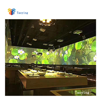 Projecteur immersif d'hologramme de projection de restaurant créatif interactif d'intérieur pour une expérience unique de salle de banquet