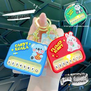 พวงกุญแจยางรูปสัตว์ขนาดเล็กของแท้ขายส่ง พร้อมเสียงเปียโน บรรเทาความเครียด - Product Image 1