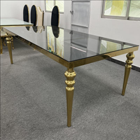 Table dorée avec dessus en verre miroir de luxe, Table ronde à deux nids en acier inoxydable pour événement, pour mariage