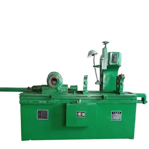 Grinding and fluting machine rolls fluting machine