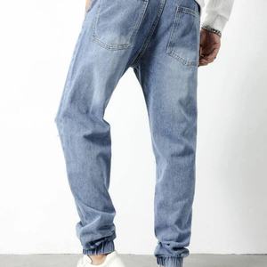 Wholesale Custom Men's Ripped Stitching <b>Jogging</b> Jeans Street Wind Ripped Stitching Boys Jeans - Product Image 6