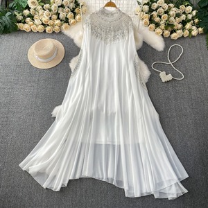 <span class=keywords><strong>Robe</strong></span> <span class=keywords><strong>Longue</strong></span> Femme Nouvelle Collection Printemps 2026 Broderie Perles Paillettes Manches Longues Couleur Unie Élégance et Tempérament Vente en Gros - Product Image 1