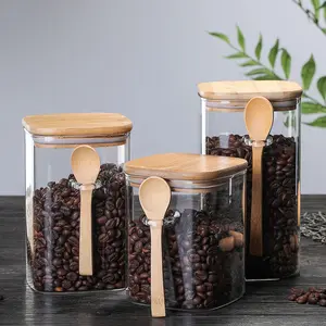 Barattolo di vetro borosilicato di forma quadrata con coperchi in legno di bambù e contenitori per alimenti da cucina con cucchiaio