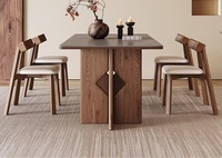 Mobilier classique européen Ensemble de salle à manger minimaliste en bois naturel noir 6 8 chaises Table à manger de luxe avec plateau en travertin