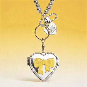 Accesorios Elegantes para <span class=keywords><strong>Bolsos</strong></span> - Mini Llavero con Espejo en Forma de Corazón y Lazo Plateado - Colgante de Espejo de Maquillaje Único Estilo Ins para <span class=keywords><strong>Mujer</strong></span> - Product Image 1