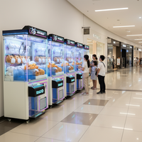 Machine à griffes d'arcade intelligente commerciale avec lecteur de carte pour aire de jeux pour enfants et centre commercial à fort retour sur investissement