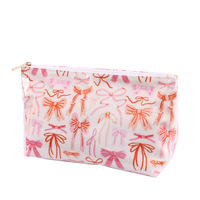Sac de maquillage tendance en vinyle transparent avec nœud rose pour femme, sac de toilette de voyage, organiseur de cosmétiques en PVC
