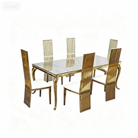 Ensemble de tables et de chaises pour événements en acier inoxydable doré et verre trempé pour occasions spéciales