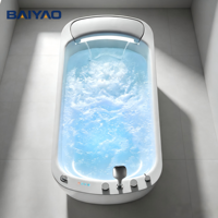 Baignoire de massage à remous en acrylique, vente directe usine, avec panneau latéral en verre, robinet cascade et éclairage LED, idéale pour hôtels et villas