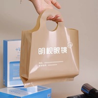 Sacs à provisions en plastique avec logo personnalisé avec trous de poinçonnage transparents Sacs de protection du vêtement pour l'emballage de vente au détail de vêtements