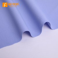 Tissu TR en gros, extensible dans les 4 sens, 78% polyester, 18% rayonne, 4% élasthanne, tissé, respirant, 270 g/m², tissu uni teint pour vêtements de fille