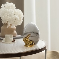 Flolenco Handgefertigte Luxus-Stil Niedliche Hasen-Figur Eiförmige Keramik-Kaninchen-Statue Skulptur Heim-Deko Oster-Dekoration