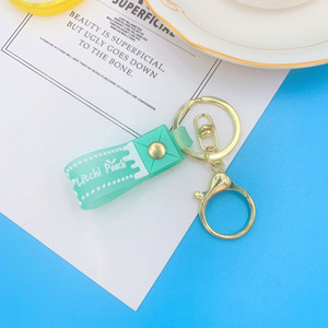 Cordon de poignet court avec boucle de clé en <span class=keywords><strong>pvc</strong></span> en caoutchouc <span class=keywords><strong>souple</strong></span> <span class=keywords><strong>transparent</strong></span> bon marché de couleur bonbon avec porte-clés en métal doré - Product Image 4