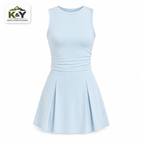 Ensemble de tennis décontracté pour femmes, débardeur sans manches et jupe plissée en nylon et élasthanne, vêtements de sport pour la vente en gros