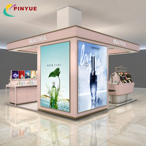 ตู้โชว์เครื่องสำอางสีชมพูสุดหรู พร้อมชั้นวางไฟ LED เคาน์เตอร์ขายเครื่องสำอางแบบเกาะกลางสำหรับตกแต่งภายในร้านค้าในห้างสรรพสินค้า - Product Image 1