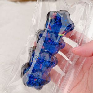 ของเล่นบีบคลายเครียดรูปใบโคลเวอร์สี่แฉกสีฟ้าใส ประดับกลิตเตอร์เลเซอร์ - Product Image 5
