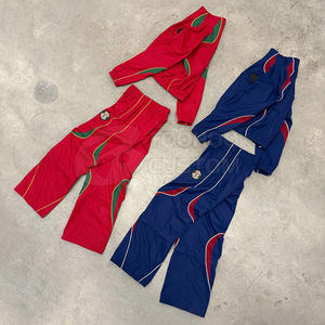 ชุดวอร์มไนลอนแบบมีซิป ปักโลโก้ตามสั่ง เสื้อแจ็คเก็ตไนลอน กางเกงวอร์ม กันน้ำ ผลิตชุดวอร์ม - Product Image 1